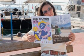 Photo d'une femme lisant le nouveau magazine de la Ville Mai-Juin 2025